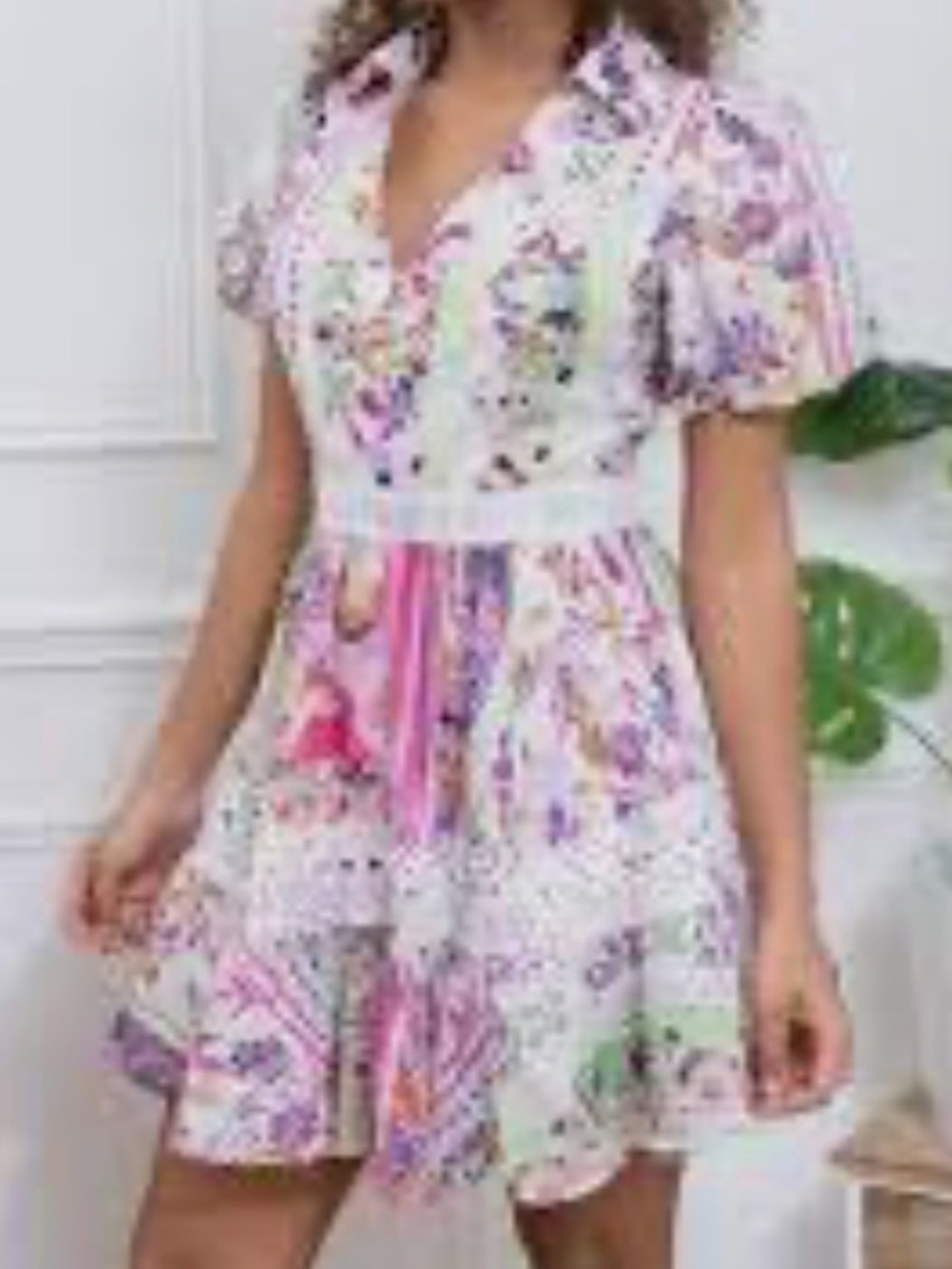 Floral  dress accented with intricate white lace trim panels along the waist .M